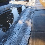 Pooling water due to Depression on Road at 12127 152 A Ave Nw, Edmonton, Ab T5 X 1 R1, Canada