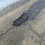Potholes at 320 Secord Boulevard NW