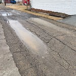 Pooling water due to Depression on Road at 10806 151 Street NW