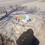 Overflowing Garbage Cans at 4816 131 Ave Nw, Edmonton T5 A 3 G9