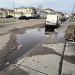 Potholes at 3015 34 A Ave NW