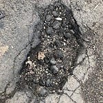 Potholes at 1920 37 B Avenue NW
