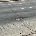 Potholes at 9647 101 Street NW