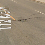 Potholes at 8808 112 Ave NW