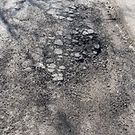 Potholes at 15515 95 Avenue NW