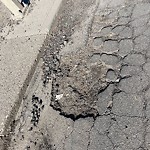 Potholes at 15431 95 Avenue NW
