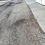 Potholes at 14203 72 Street NW