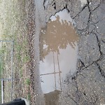 Potholes at 10620 64 Ave Nw, Edmonton T6 H 1 S9
