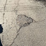 Potholes at 6015 93 A Avenue NW