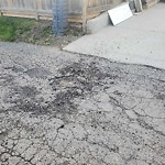 Potholes at 14124 73 Street NW