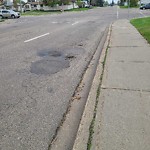 Potholes at 13708 74 Street NW