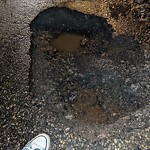 Potholes at 11308 C 130 Avenue NW