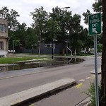 Pooling water due to Depression on Road at 7021 106 Street NW
