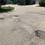 Potholes at 708 Butterworth Dr NW Bulyea Heights