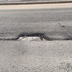 Potholes at 11603 Jasper Avenue NW