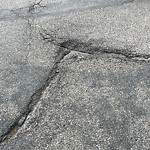 Potholes at 1426 Lakewood Road West NW