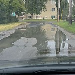 Pooling water due to Depression on Road at 11135 118 Street NW