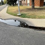 Pooling water due to Depression on Road at 10604 34 Street NW