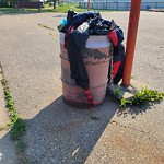 Overflowing Garbage Cans at 505 Wolf Willow Road NW