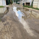 Pooling water due to Depression on Road at 10942 89 Avenue NW