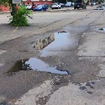 Pooling water due to Depression on Road at 10140 119 Street NW