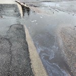 Pooling water due to Depression on Road at 3404 138 Avenue NW