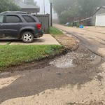 Pooling water due to Depression on Road at 11337 52 Street NW