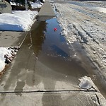 Pooling water due to Depression on Road at 7123 Saskatchewan Drive NW