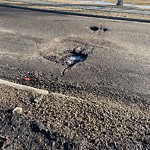 Potholes at 7128 Ada Boulevard NW