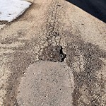 Potholes at 5069 Thibault Way NW