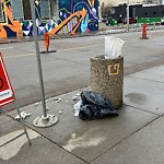Overflowing Garbage Cans at 10606 102 Avenue NW