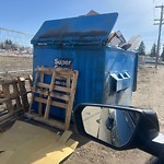 Overflowing Garbage Cans at 12816 Yellowhead Trail NW