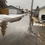 Pooling water due to Depression on Road at 15725 108 Avenue NW
