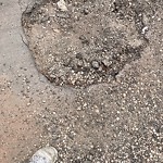 Potholes at 18709 57 Avenue NW