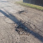 Potholes at 6206 132 Avenue NW