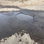 Potholes at 9755 92 St Nw, Edmonton T6 C 3 S3
