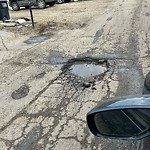 Potholes at 10224 148 Street NW