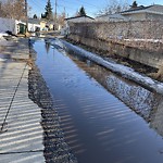Pooling water due to Depression on Road at 10652 74 St NW
