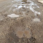 Potholes at 13204 Fox Drive NW