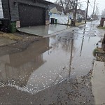 Pooling water due to Depression on Road at 9747 73 Avenue NW