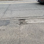 Potholes at 9929 Saskatchewan Drive NW