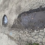 Potholes at 11516 44 Ave Nw, Edmonton T6 J 0 Z5
