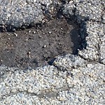 Potholes at 10809 Saskatchewan Drive NW