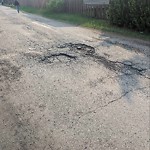 Potholes at 13327 105 Street NW