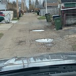 Potholes at 12023 56 Street NW