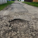 Potholes at 13817 118 Street NW