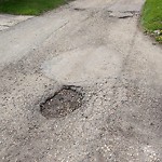 Potholes at 7307 98 A Avenue NW