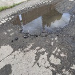 Potholes at 9914 153 Street NW