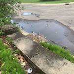 Pooling water due to Depression on Road at 13604 127 Avenue NW