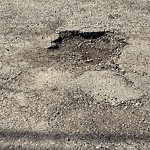 Potholes at 3520 113 B Street NW